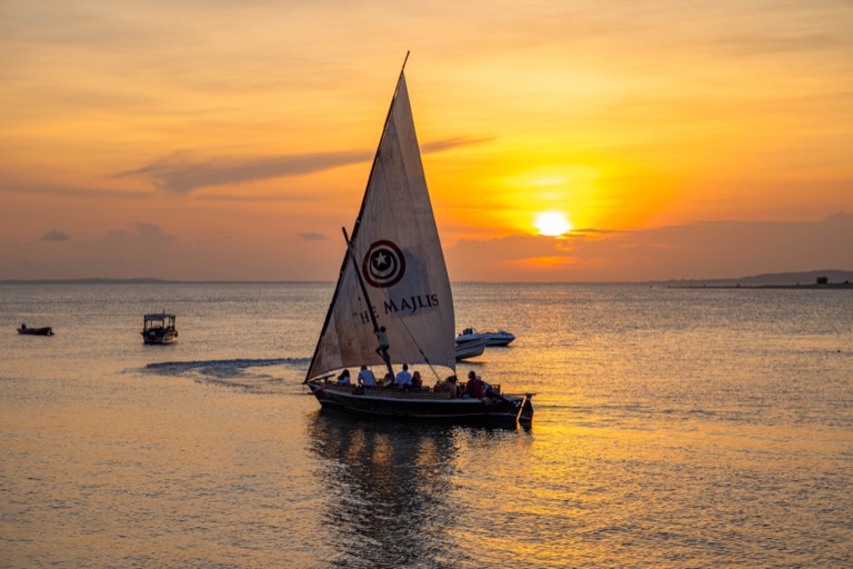 The Majlis dhow sailing at sunset